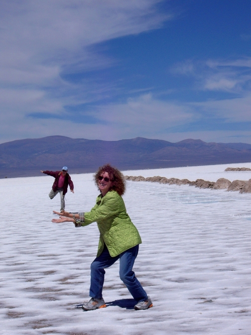 My mom and dad, playing with optical illusions on the salt flats of Argentina