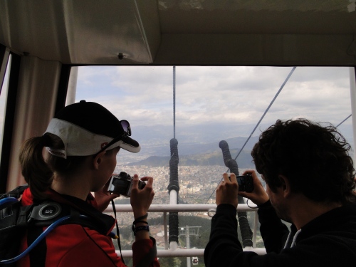 Friends take pictures as we rise to the peak of Pichincha Volcano, thousands of feet above the second highest capital in the world, Quito, Ecuador. 